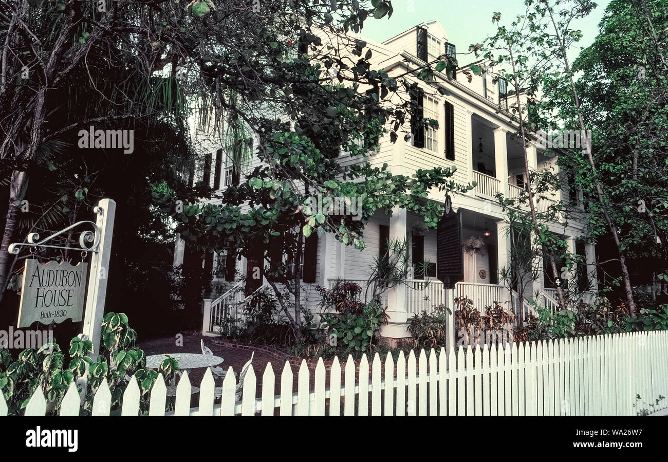 Now known as the Audubon House, this white wooden home was named for famed ornithologist and artist John James Audubon who visited and painted there in 1832 during his visit to Key West in the Florida Keys at the southern tip of Florida, USA. The three-story structure is open to visitors after being restored in its American Classic Revival architectural style with fine furnishings of the 1800s. The Audubon House Museum & Tropical Gardens features 28 first-edition works of the painter's watercolor drawings that appear in his remarkable 'Birds of America' book. Stock Photo