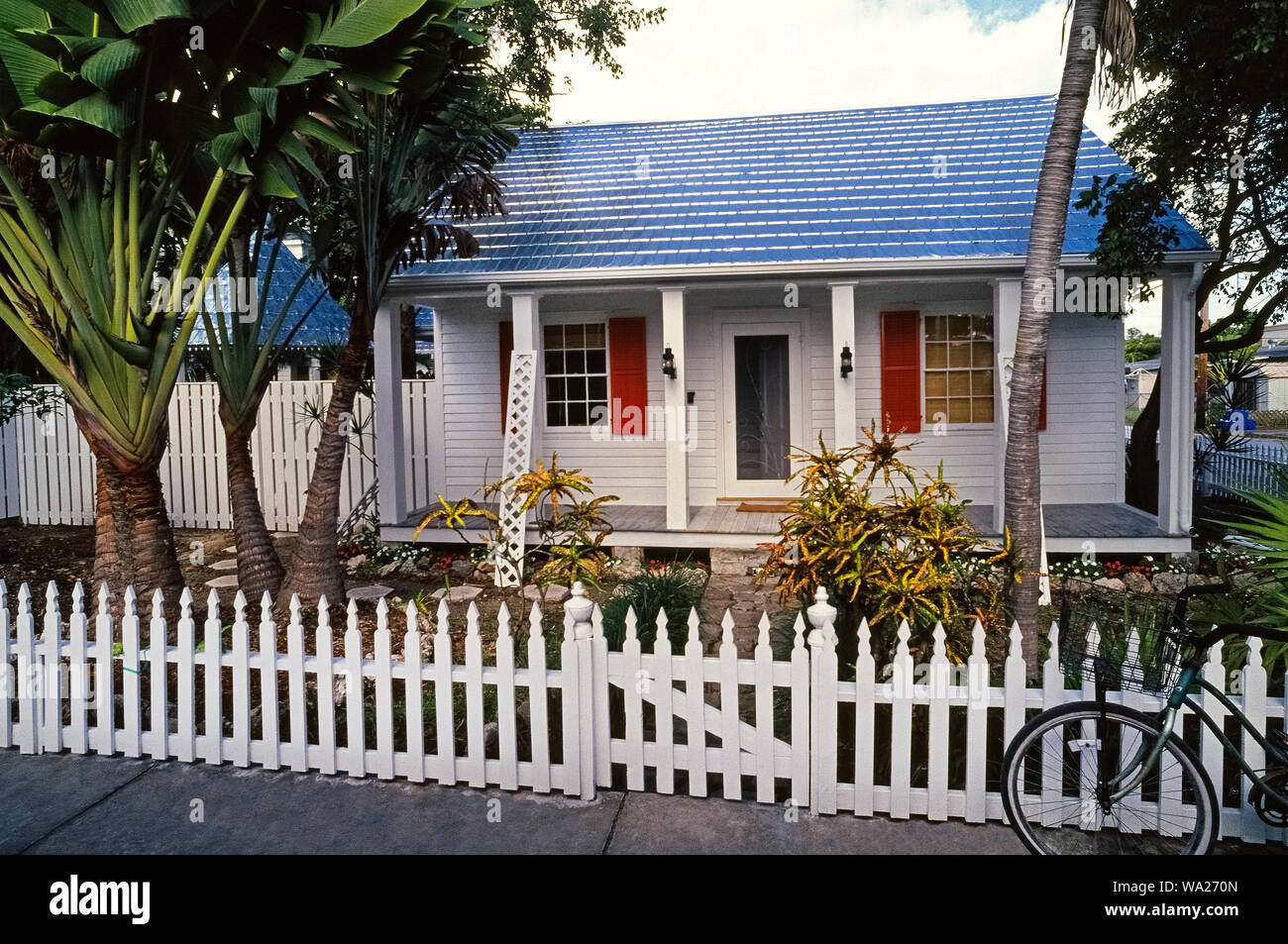 Famous American playwright Tennessee Williams lived for 34 years in this modest 1933 home on Duncan Street in Key West, Florida, USA. Before his death in 1983 at age 71, Williams wrote 'The Glass Menagerie,' 'A Streetcar Named Desire,' 'Cat on a Hot Tin Roof' and other stage classics that also became major motion pictures. The house is privately owned and not open to the public, but visitors to the Florida Keys can learn more about the playwright's life at the Tennessee Williams Museum in an 1884 bungalow at 513 Truman Avenue in Key West. Stock Photo