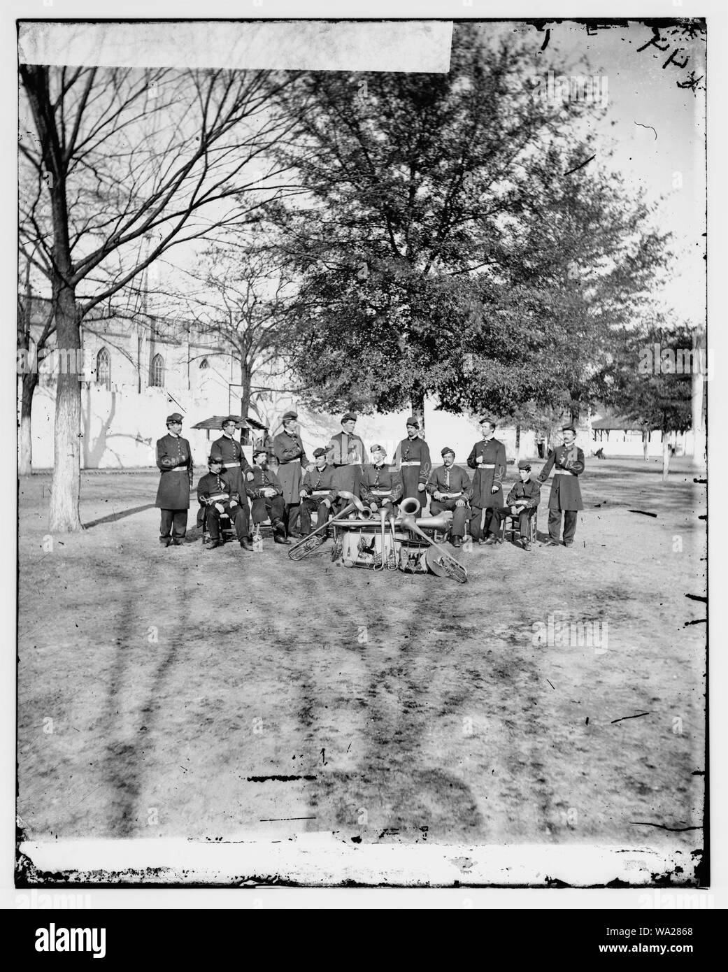 Band group seated behind their instruments Stock Photo