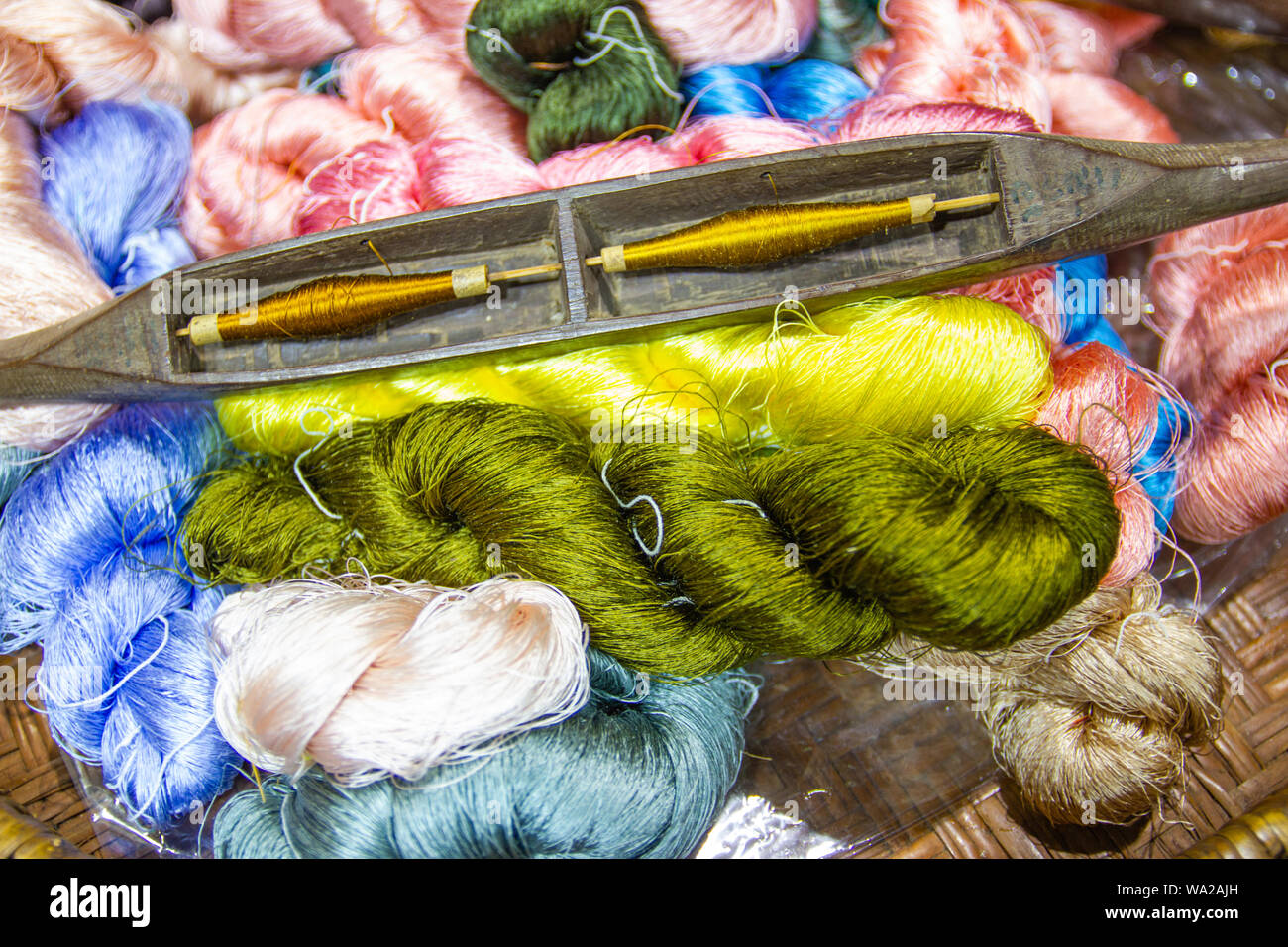 Colorful Of Silk Yarn For Ready To Weaving Stock Photo, Picture and Royalty  Free Image. Image 124520093.