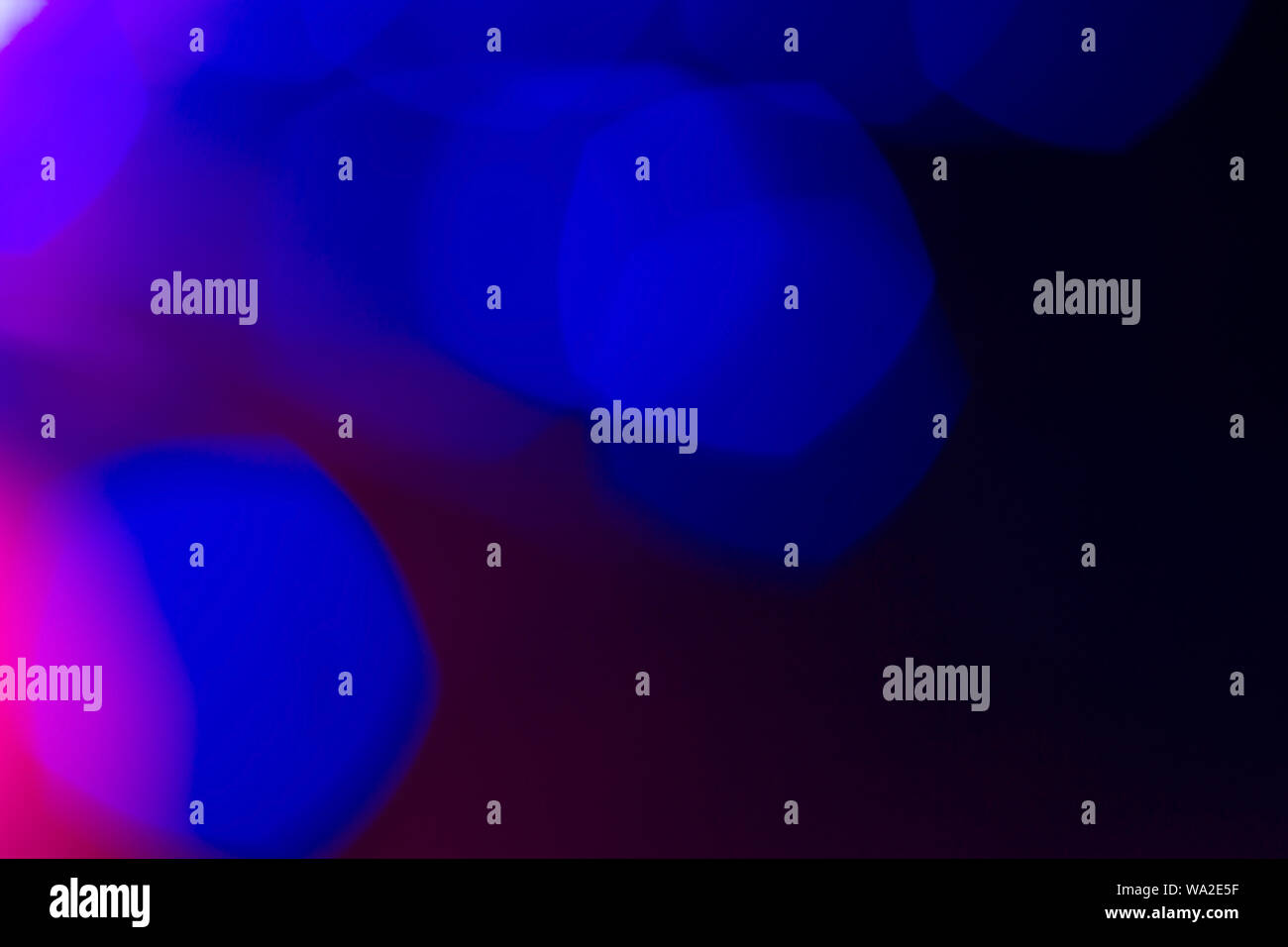 Blue bokeh lights on dark background; abstract background Stock Photo ...