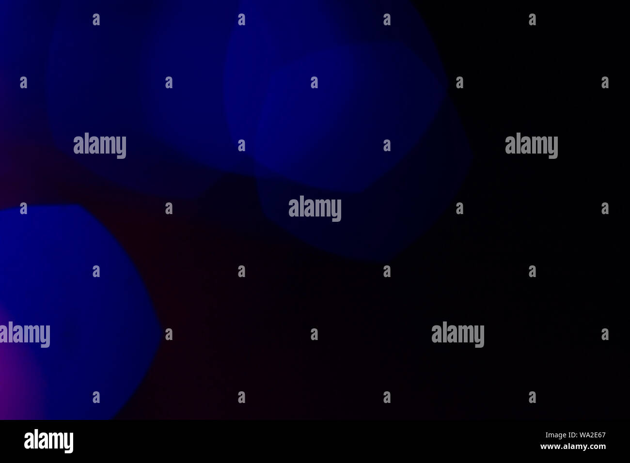 Blue bokeh lights on dark background; abstract background Stock Photo ...