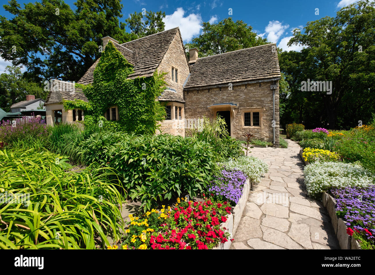 Cotswold Cottage and its surrounding English gardens, located in Greenfield Village at the Henry Ford Museum located in Dearborn, Michigan, USA Stock Photo