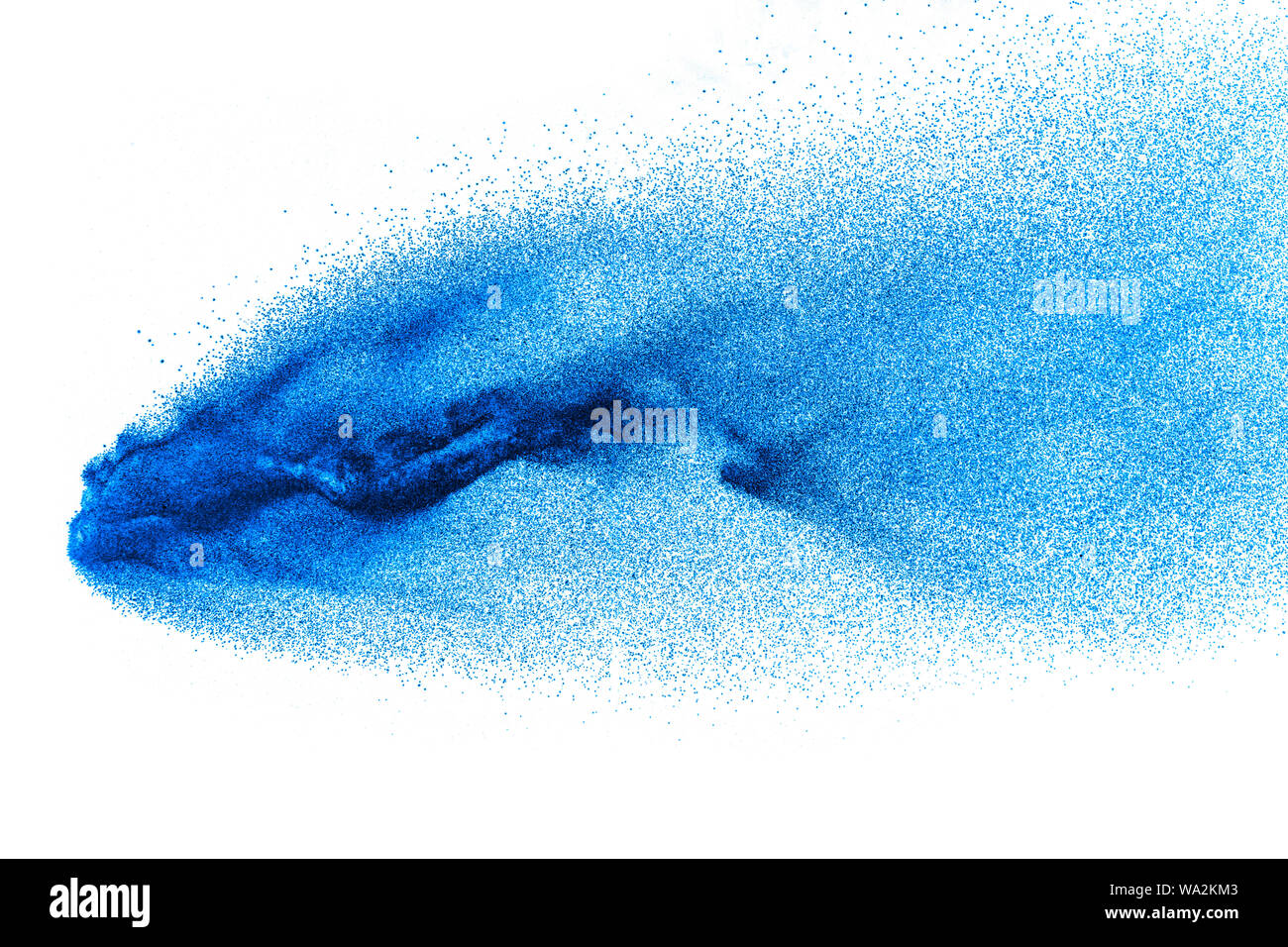 Blue color dust particles splash on white background Stock Photo - Alamy