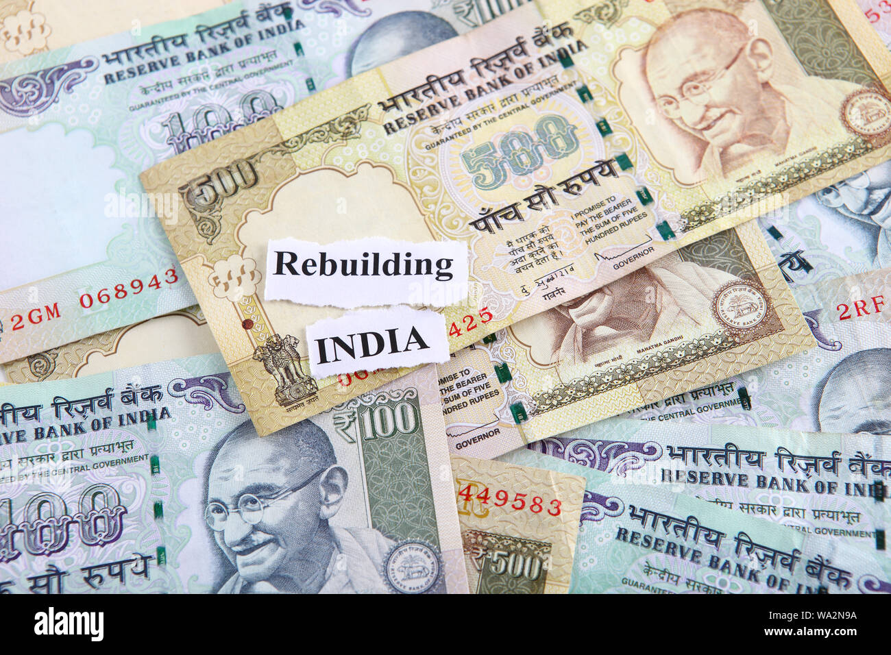 Indian paper currency with labels Rebuilding India Stock Photo Alamy