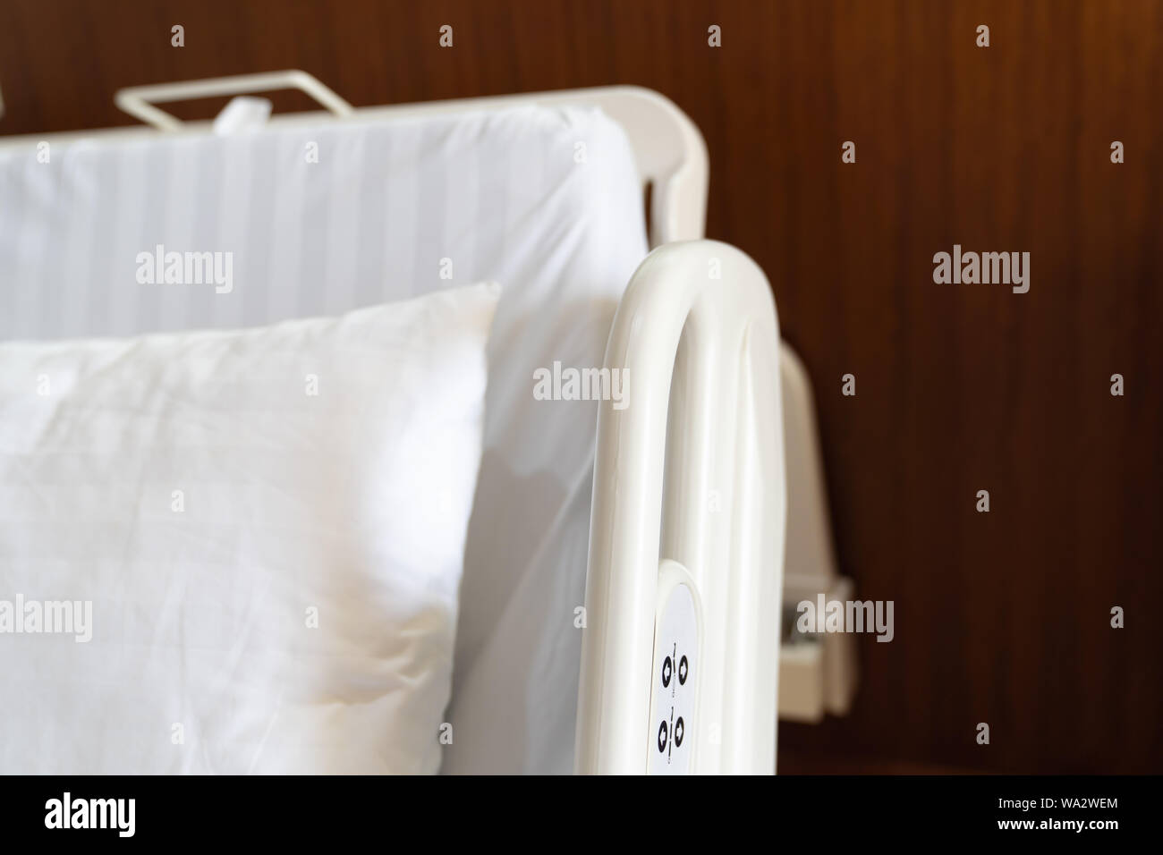 Close Up, Hospital bed remote control hanging on the bed rail, luxury