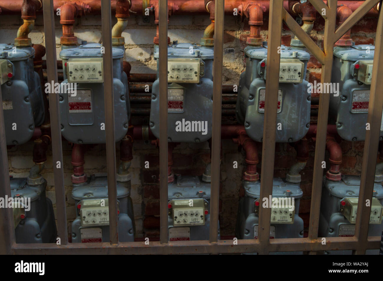 Gas meter behind a metal fence hires stock photography and images Alamy