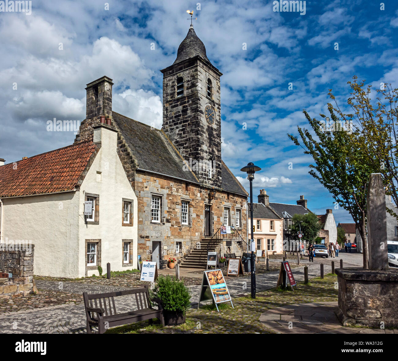Entrance to National Trust for Scotland office and Culross Town House Sandhaven with clock tower in The Royal Burgh of Culross Fife Scotland UK Stock Photo