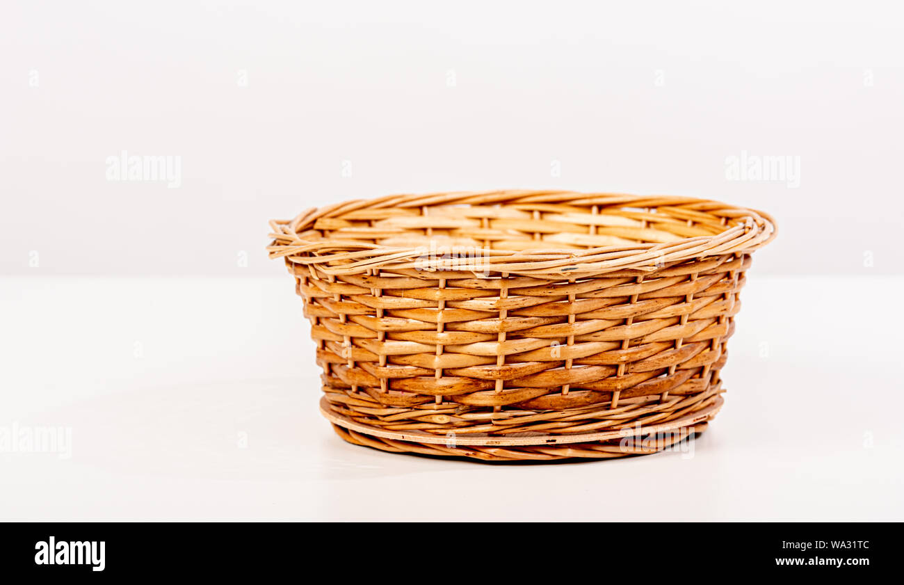 Empty wooden basket for fruit or bread. Stock Photo