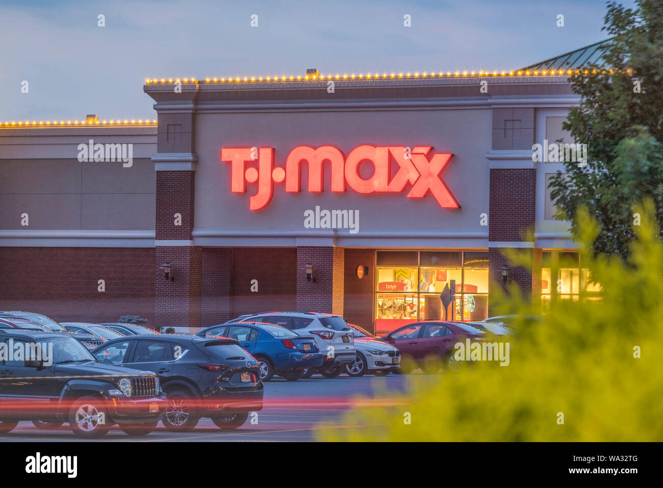 NEW HARTFORD, NEW YORK - AUG 16, 2019: TJ Maxx store and parking. TJ