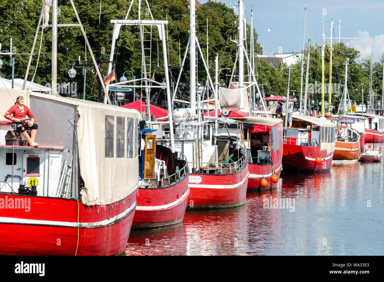 Warnemunde harbor, fishing boats moored in Old Canal, Alter Strom, Rostock Germany Stock Photo