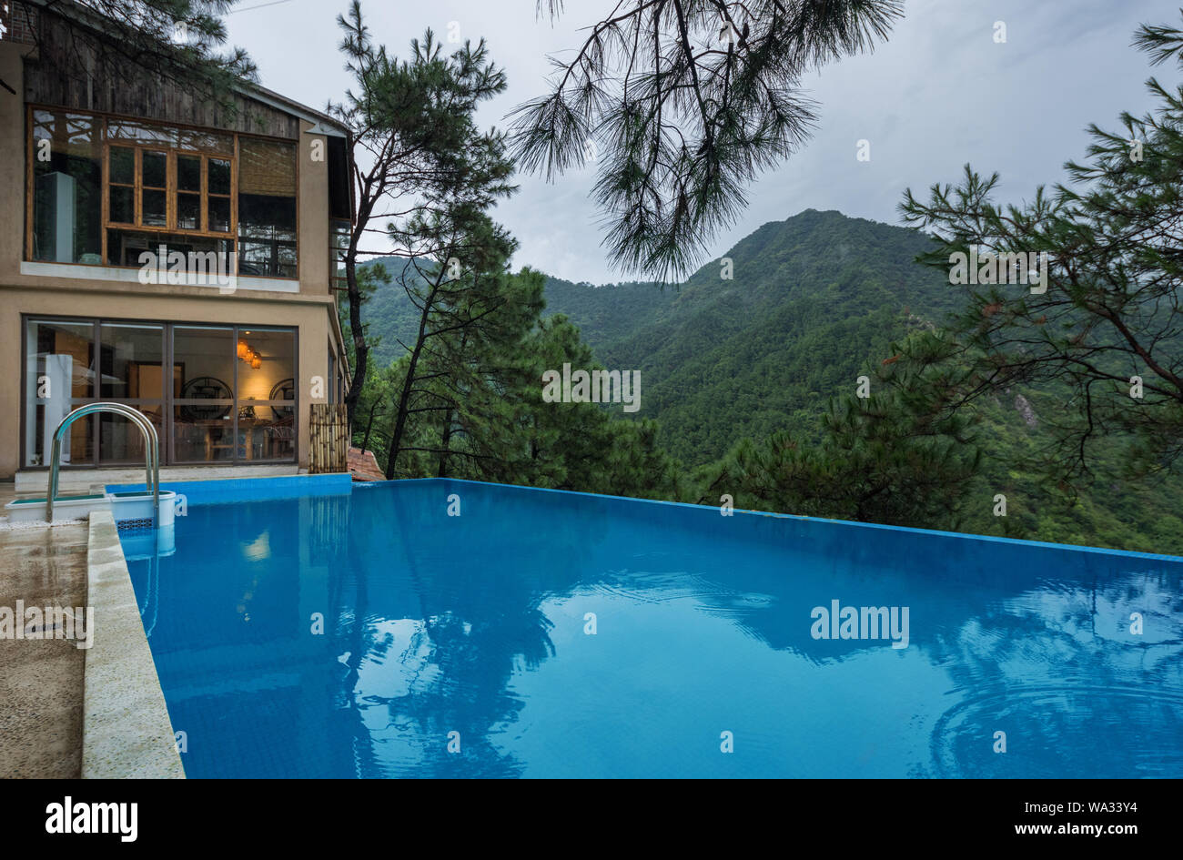 Home stay facility swimming pool in the mountains Stock Photo