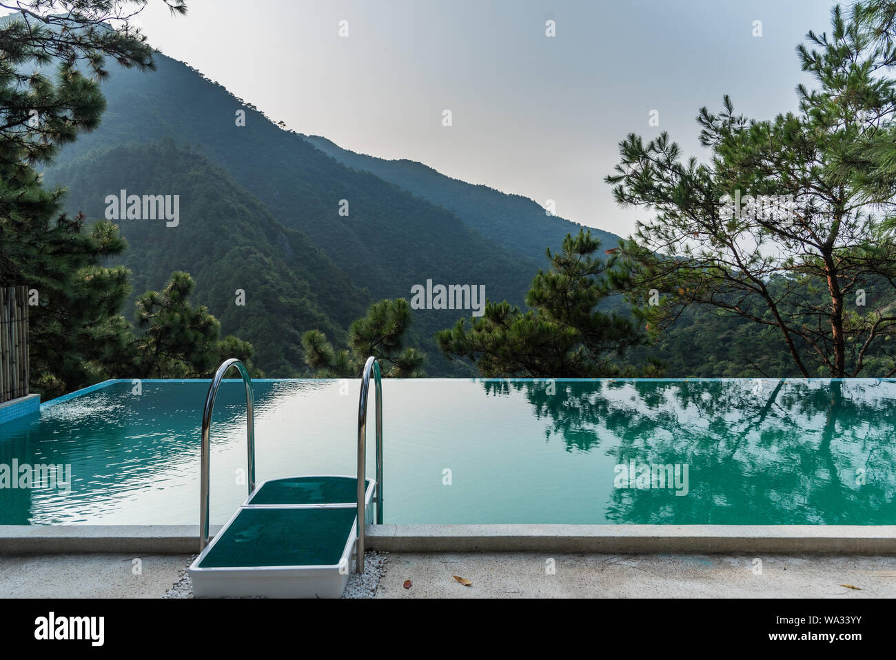 Home stay facility swimming pool in the mountains Stock Photo