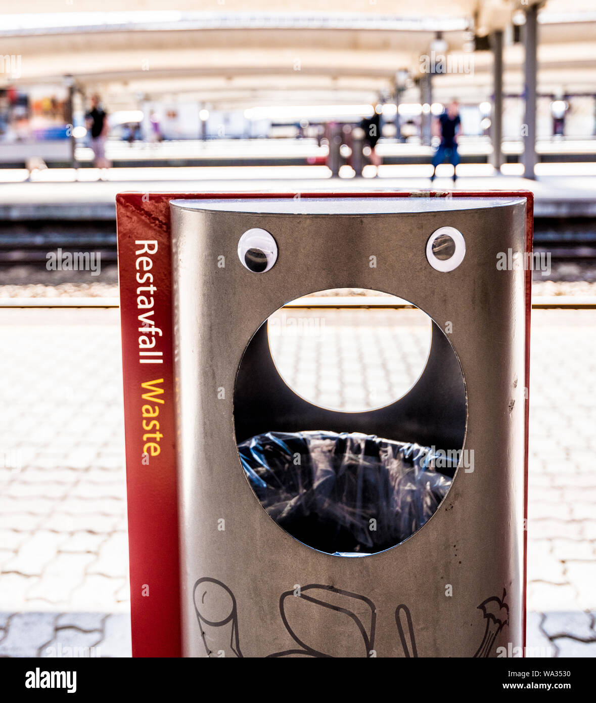 Surprised trash can with googly eyes Stock Photo Alamy