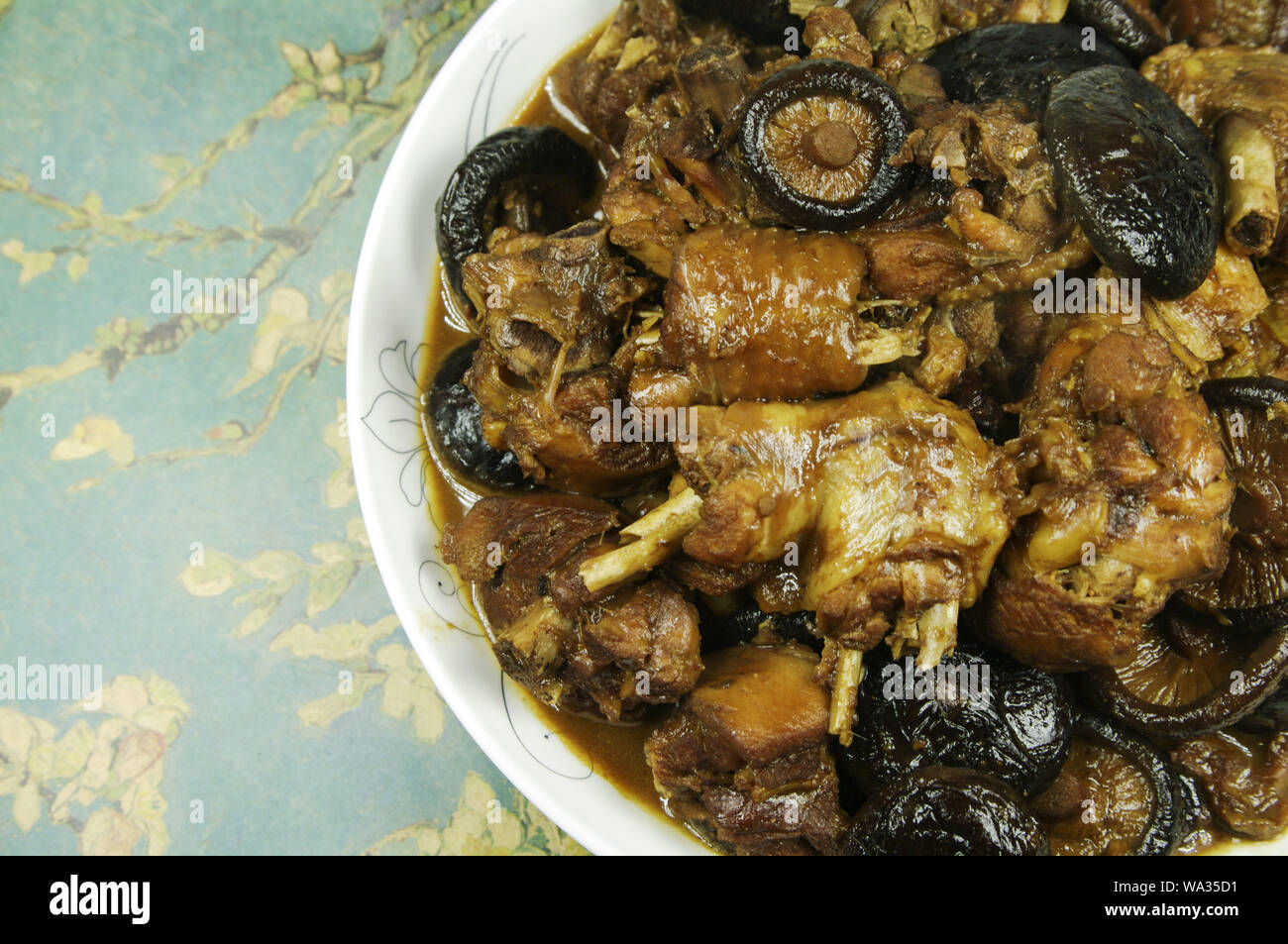 Xianggu mushroom stewed chicken Stock Photo Alamy