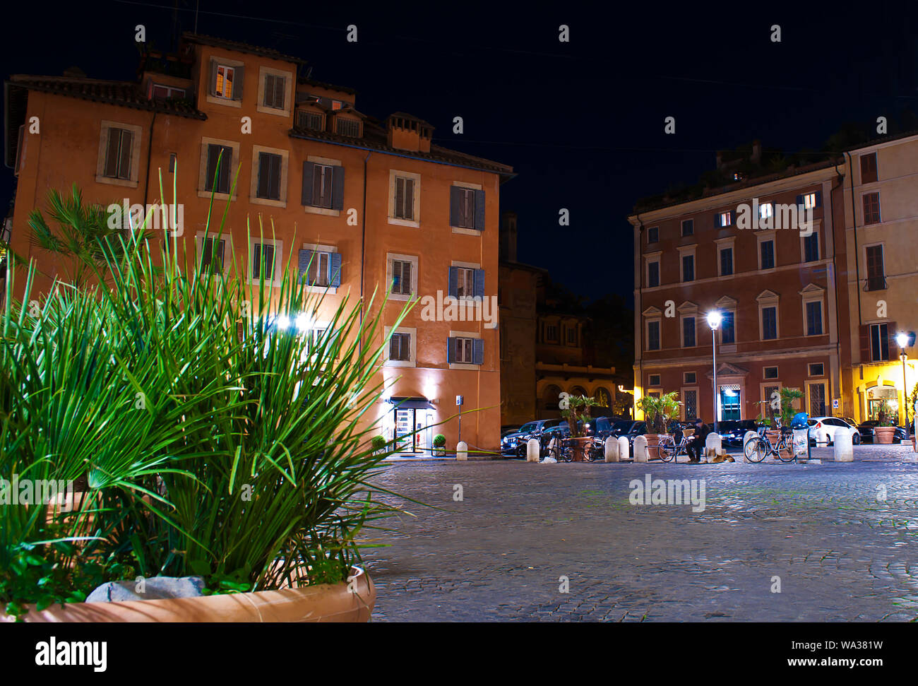 Solitary square in the city center of the capital of Italy, Rome. Warm fall night, pitch-black sky, calm atmosphere Stock Photo