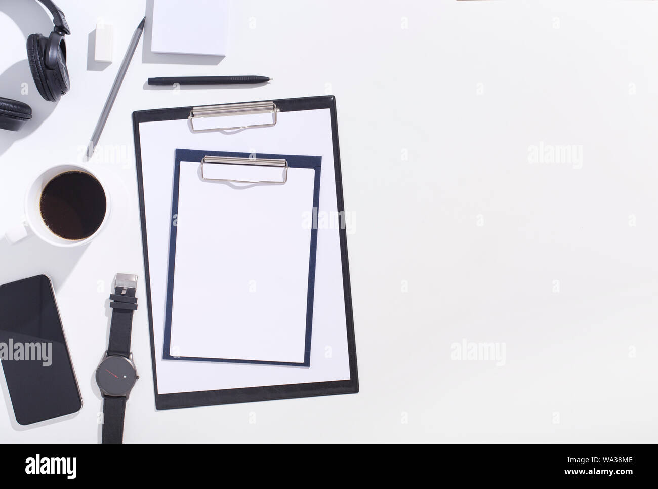 Top view of black and white office supplies with clippers on white Stock Photo Alamy