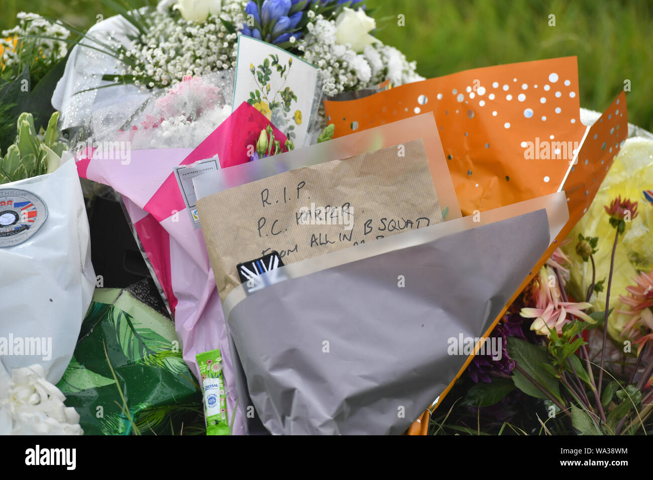 Messages on floral tributes at the scene, where Thames Valley Police officer Pc Andrew Harper, 28, died following a 'serious incident' at about 11.30pm on Thursday near the A4 Bath Road, between Reading and Newbury, at the village of Sulhamstead in Berkshire. Stock Photo