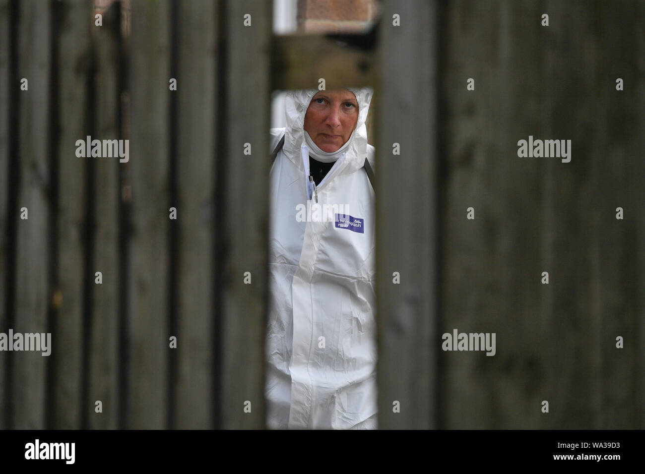 A police forensic officer works at a caravan site near Burghfield Common in Berkshire, following the death of Thames Valley Police officer Pc Andrew Harper, 28, who died following a 'serious incident' at about 11.30pm on Thursday near the A4 Bath Road, between Reading and Newbury, at the village of Sulhamstead in Berkshire. Stock Photo