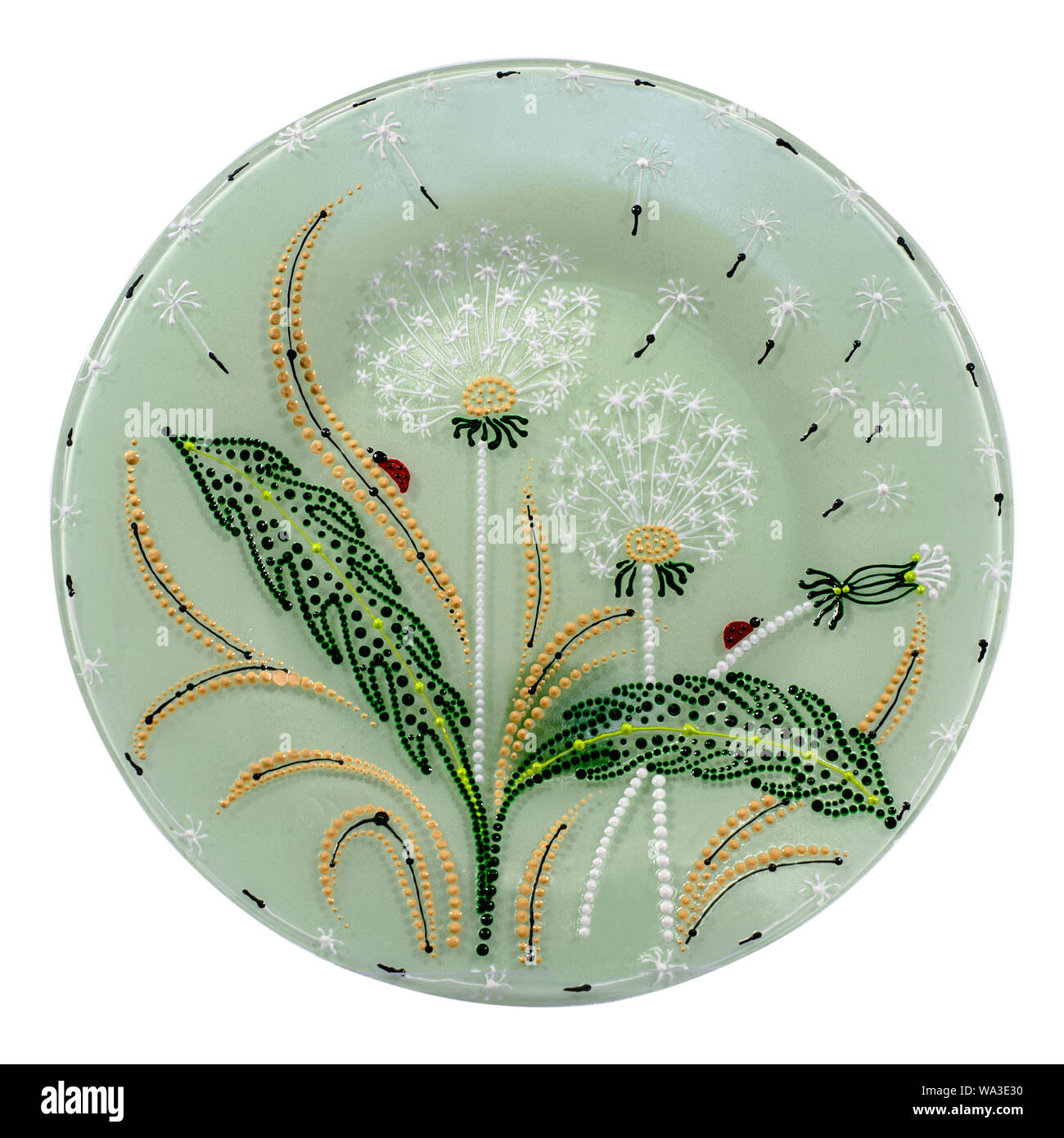 Decorative ceramic dish painted with hands. Art, handmade Stock Photo