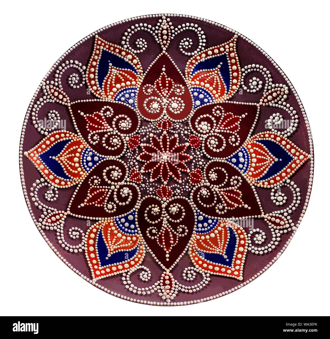 Decorative ceramic dish painted with hands. Art, handmade Stock Photo