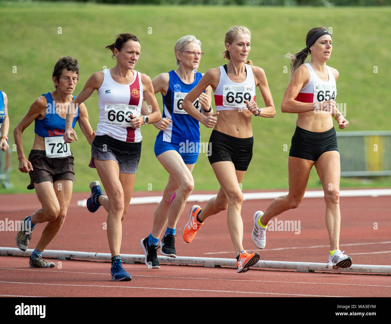 BIRMINGHAM - ENGLAND 10 AUG 2019: Susan McDonald (663) Clare Jolliffe (659) Sarah Everitte (654) competing in the 1500m  on Day two of the British Mas Stock Photo