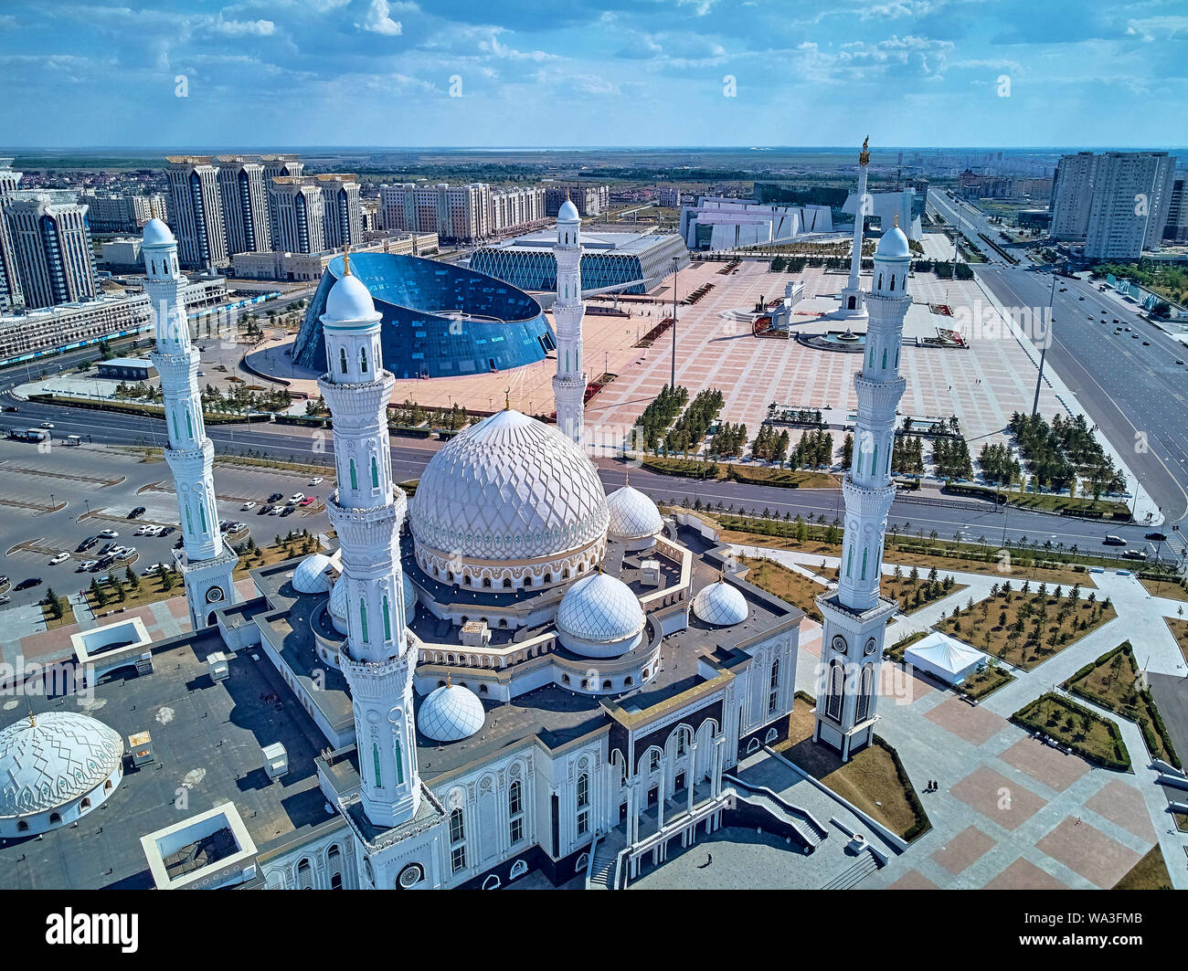 NUR-SULTAN, KAZAKHSTAN - August 11, 2019: Beautiful panoramic aerial drone view to Nursultan (Astana) city center with skyscrapers and Hazrat Sultan M Stock Photo