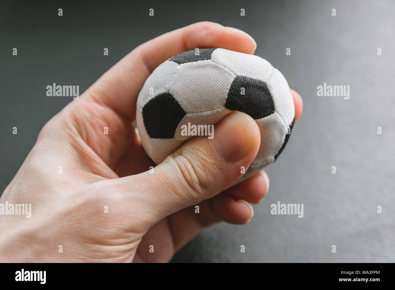 Hand squeezing ball hires stock photography and images Alamy