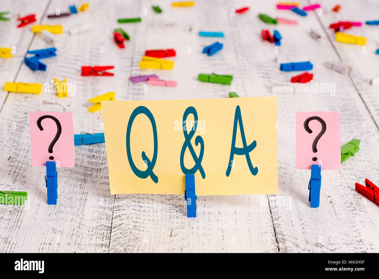 Writing note showing Q And A Question. Business concept for in which