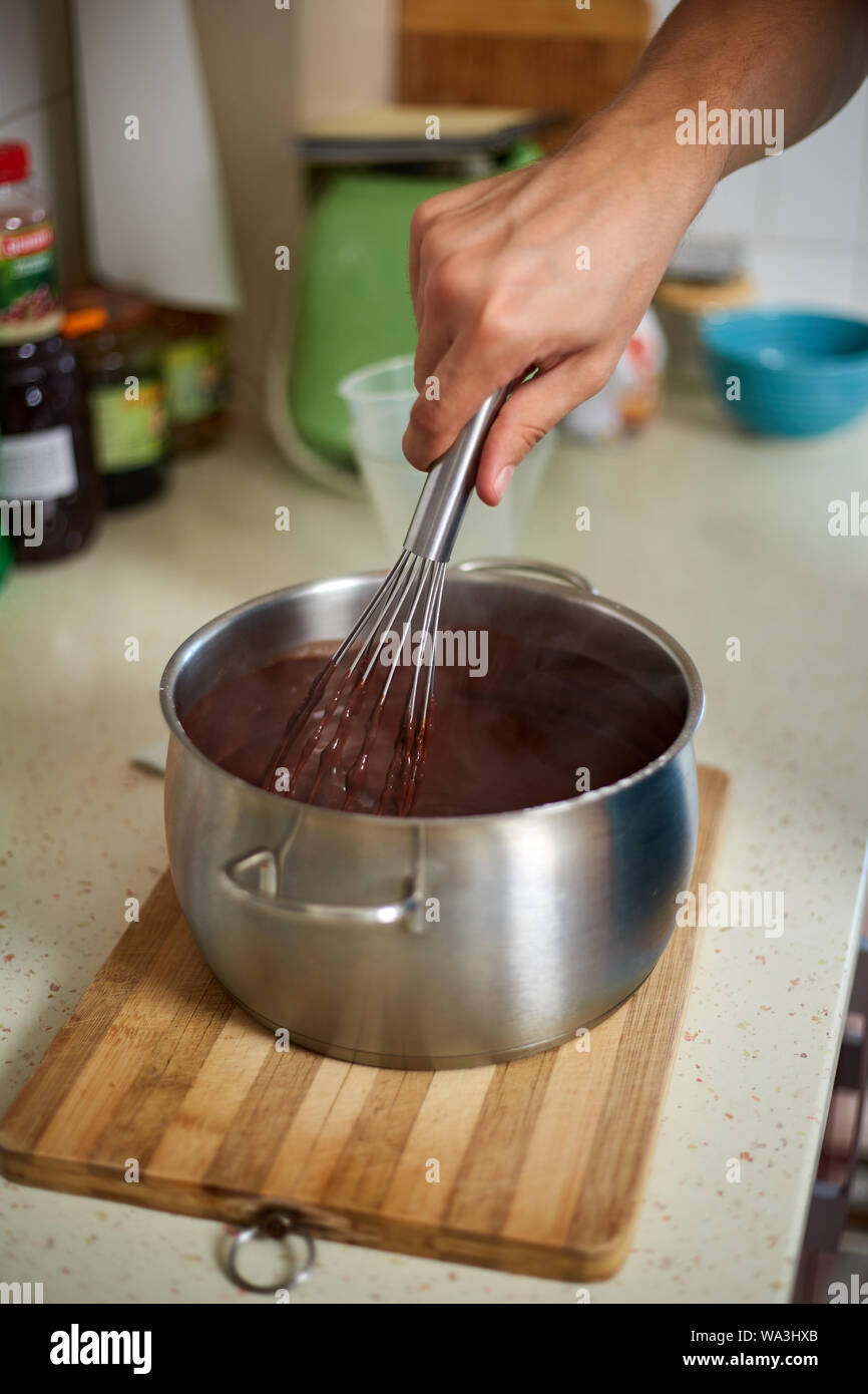 Hands of chef making pudding Stock Photo Alamy