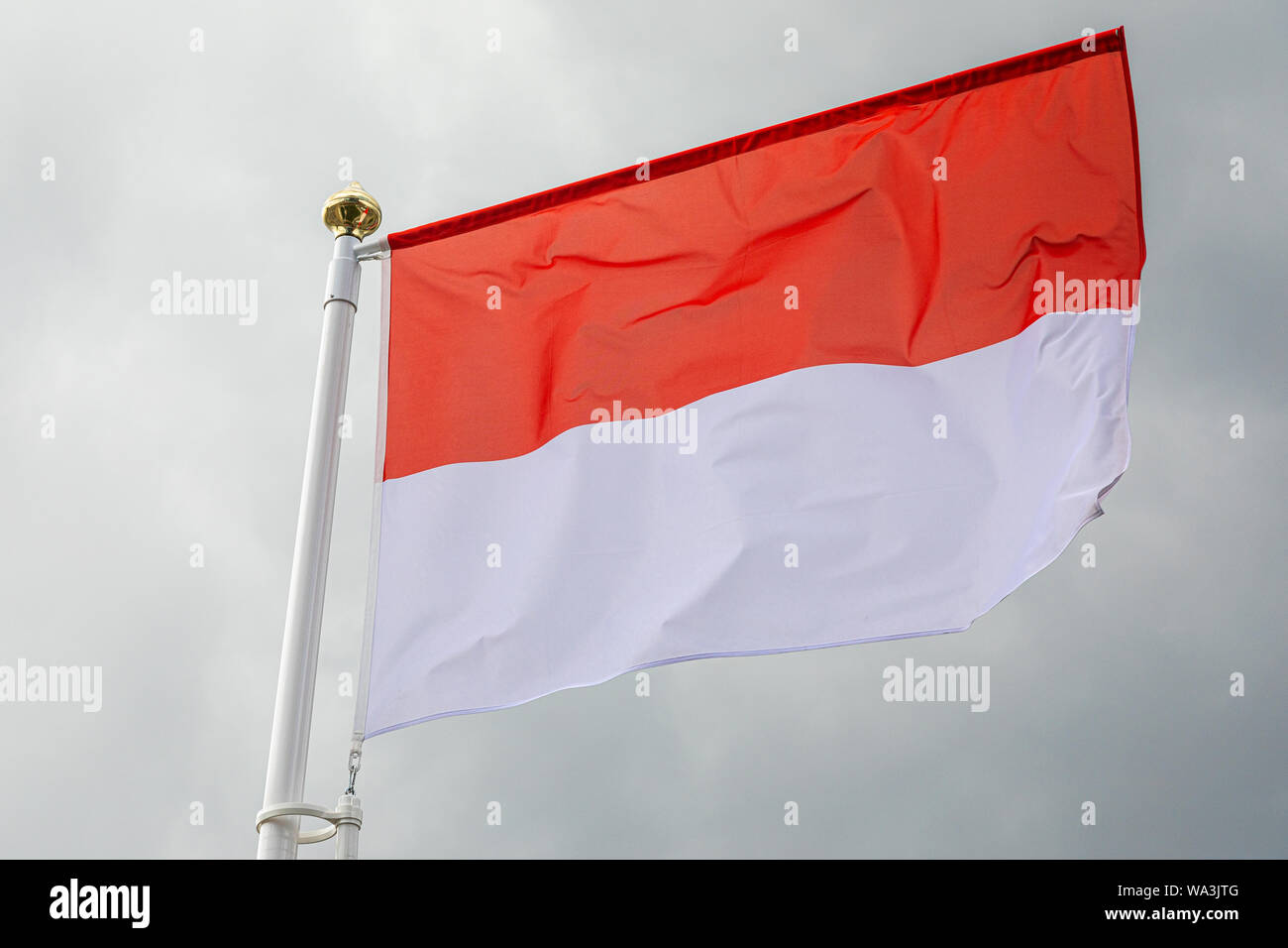 Flag Of Monaco Waving In The Wind Stock Photo Alamy Flag Of Monaco Waving In The Wind Stock Photo Alamy