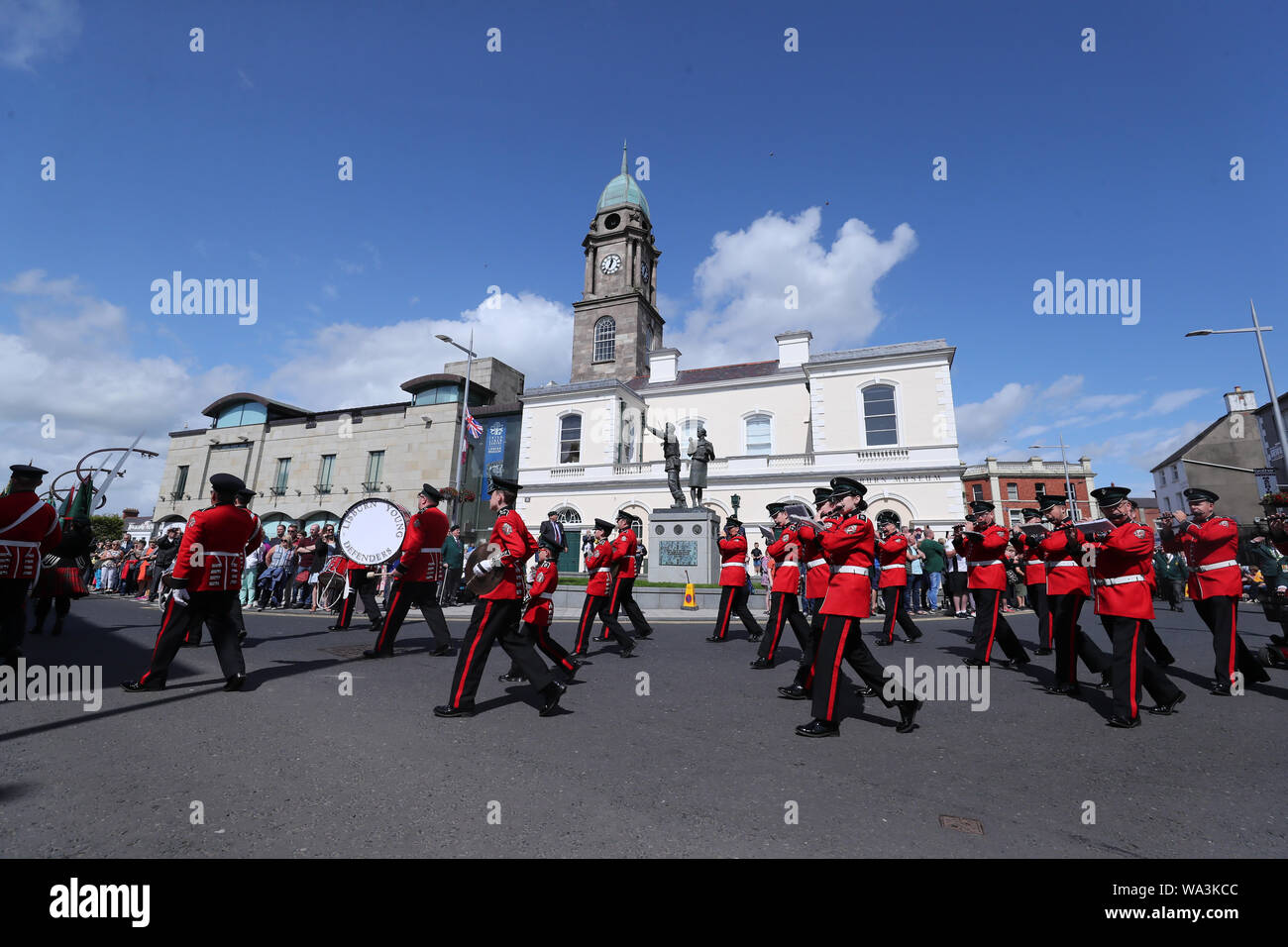 A band march past the Ulster Defence Force memorial in Lisburn city centre, during a Northern Ireland Veterans Association event to mark the 50th anniversary of Operation Banner. Stock Photo