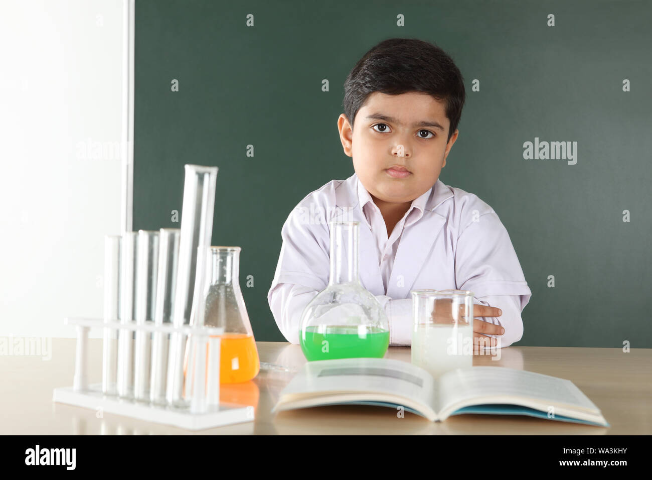 Schoolboy experimenting in a chemistry lab Stock Photo - Alamy