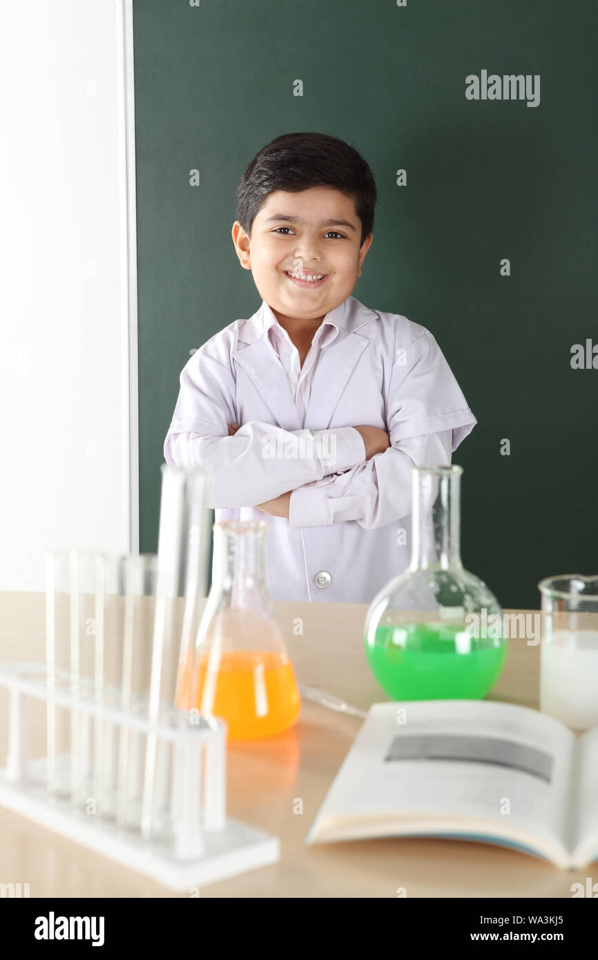 Schoolboy experimenting in a chemistry lab Stock Photo - Alamy