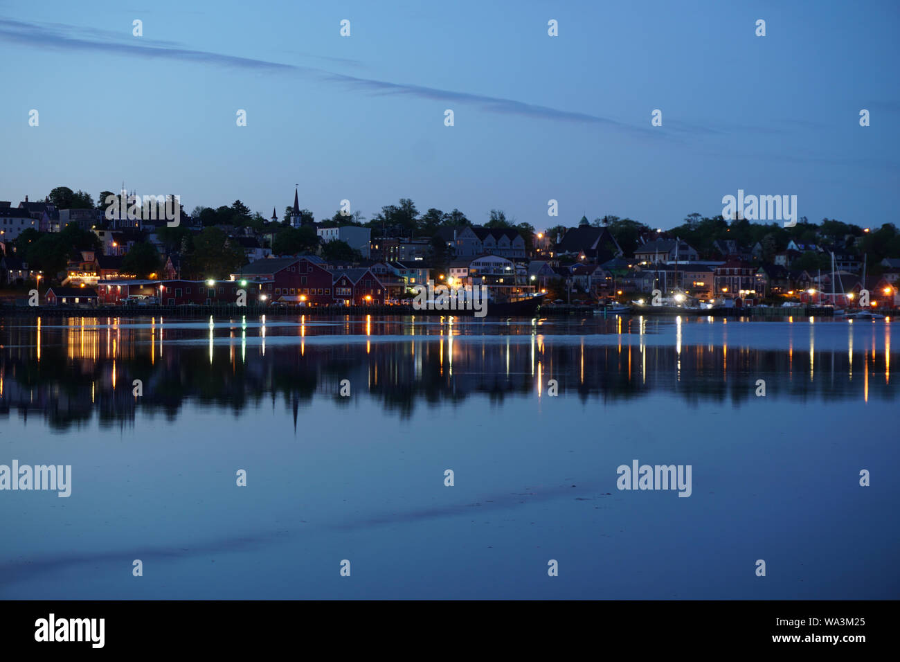 Lights of Lunenburg, Nova Scotia waterfront in the evening Stock Photo