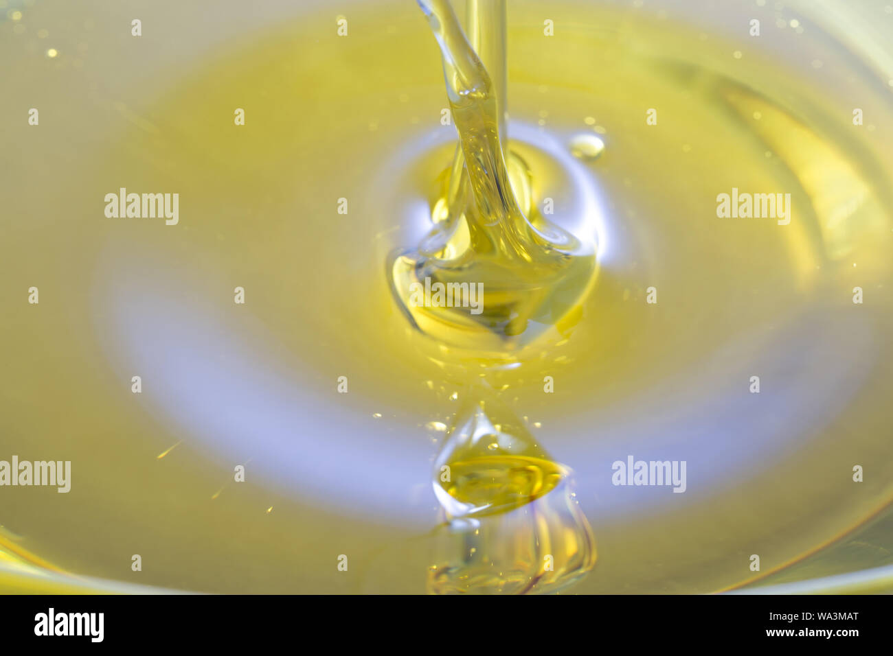 Olive oil drip into the moment Stock Photo Alamy