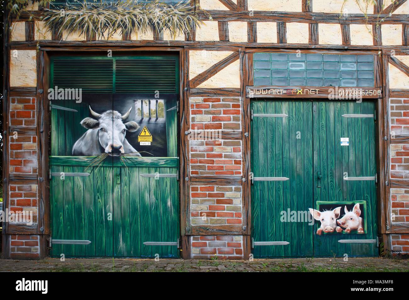 Artful, funny little house painted with animal motives, Wolgast, Mecklenburg-Western Pomerania, Germany Stock Photo