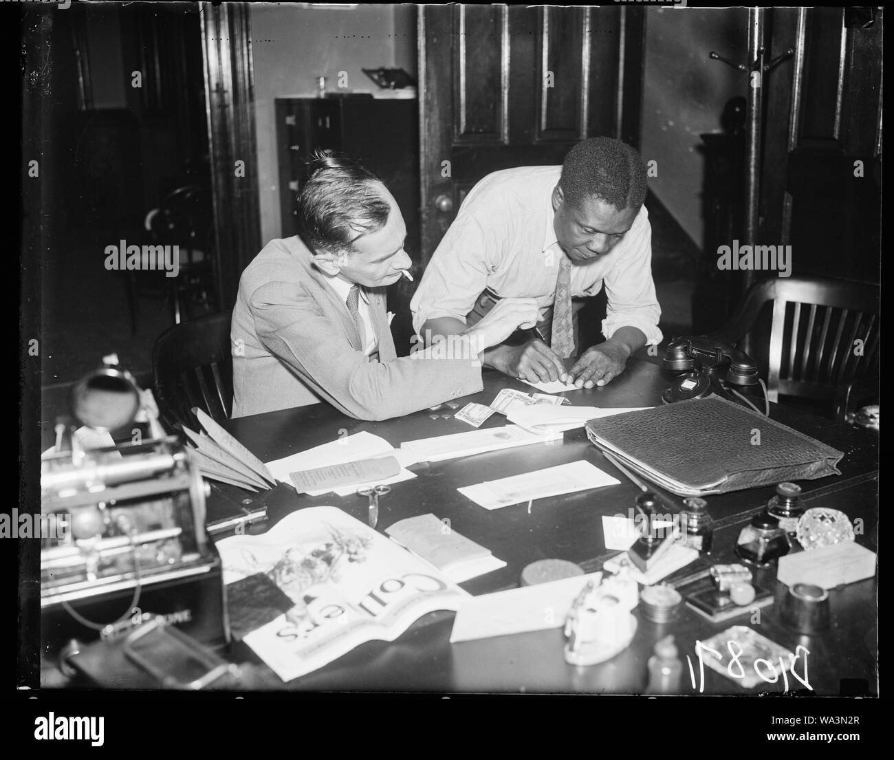 Blind receiving pay, Burton Groves, receiving pay by Ralph H. Campbell