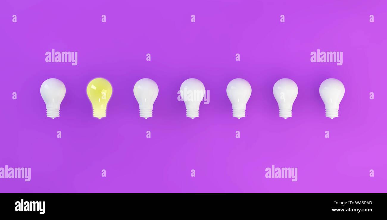 Light Bulb Glowing in the Middle of the Group Stock Photo Alamy