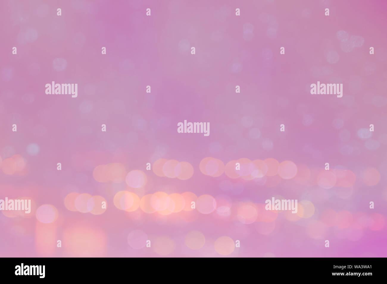Abstract light bokeh on the pink glowing background Stock Photo - Alamy