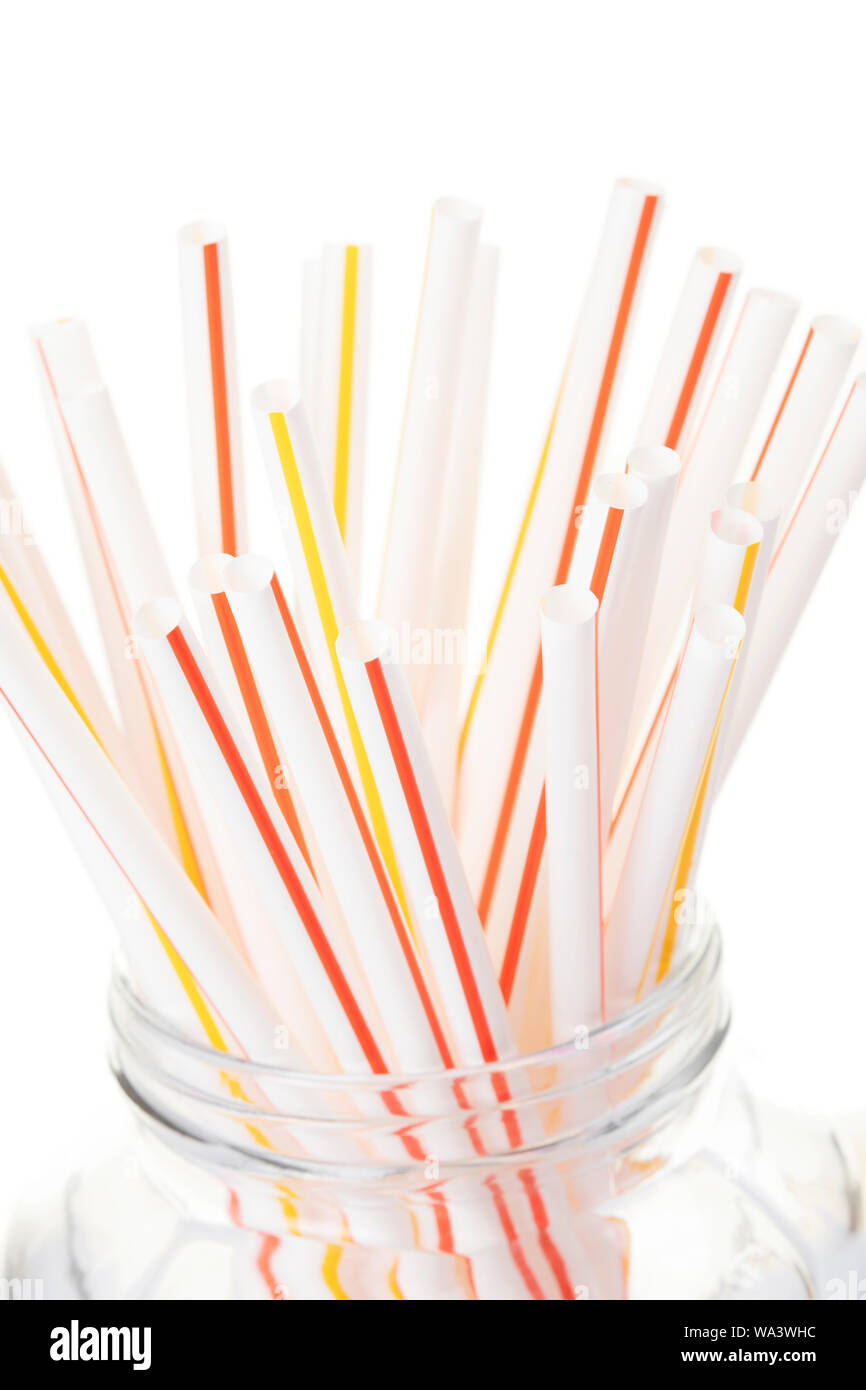 A background of colorful plastic straws used to illustrate plastic
