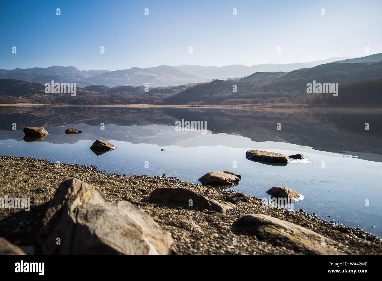 Mountain reflection on water Stock Photo