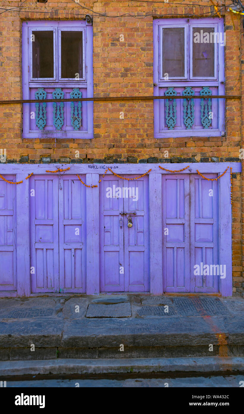 colorful house facade with wooden windows and doors in Kathmandu Stock ...
