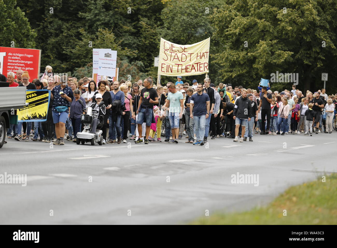 Strausberg, Germany. 17th Aug, 2019. Demonstrators with banners protest march from the Fichteplatz to the Kulturpark for the preservation of the Kulturpark. (Photo by Simone Kuhlmey/Pacific Press) Credit: Pacific Press Agency/Alamy Live News Stock Photo