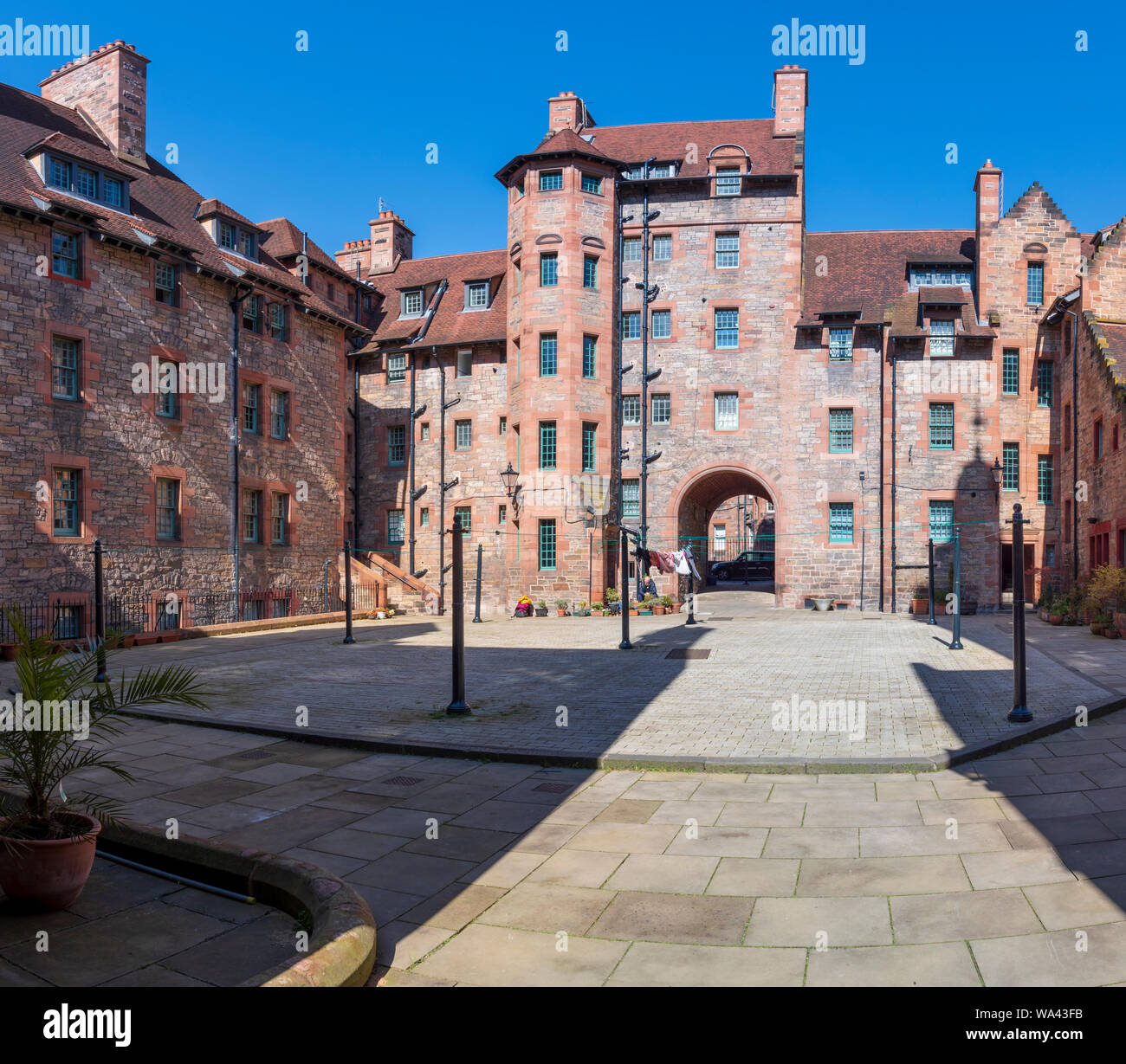 Well Court an example of historic Scottish buildings and architecture in Dean Village close by the Waters of Leith in Edinburgh, Scotland Stock Photo