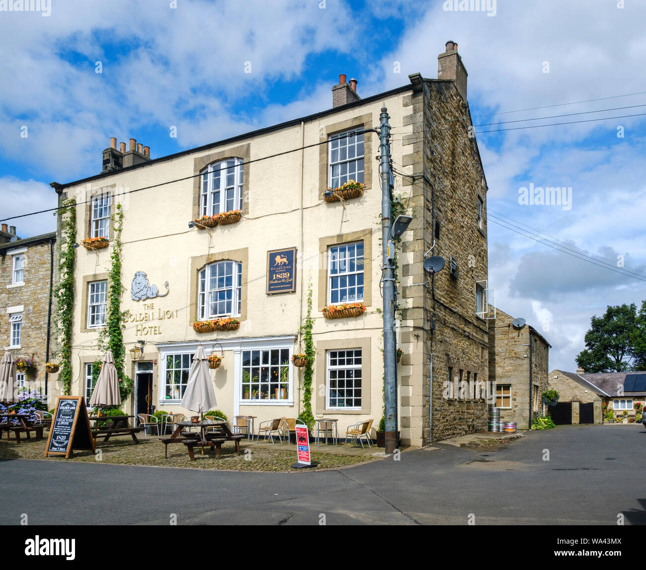 The Golden Lion Hotel and public house in Allendale Town a remote village in the North Pennine area of  Northumberland Stock Photo