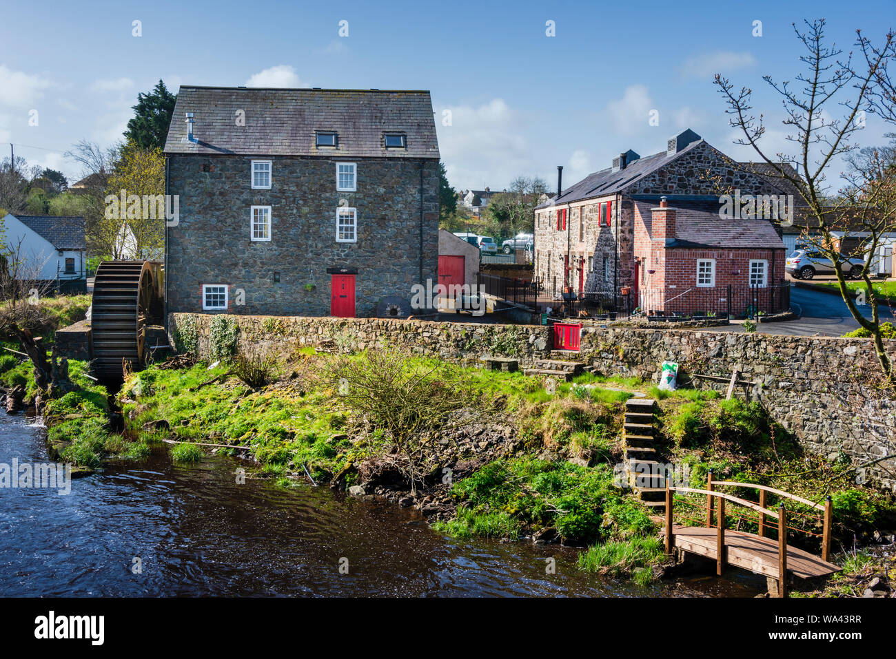 Old watermill beside the River Bush in Bushmills County Antrim Northern Ireland Stock Photo