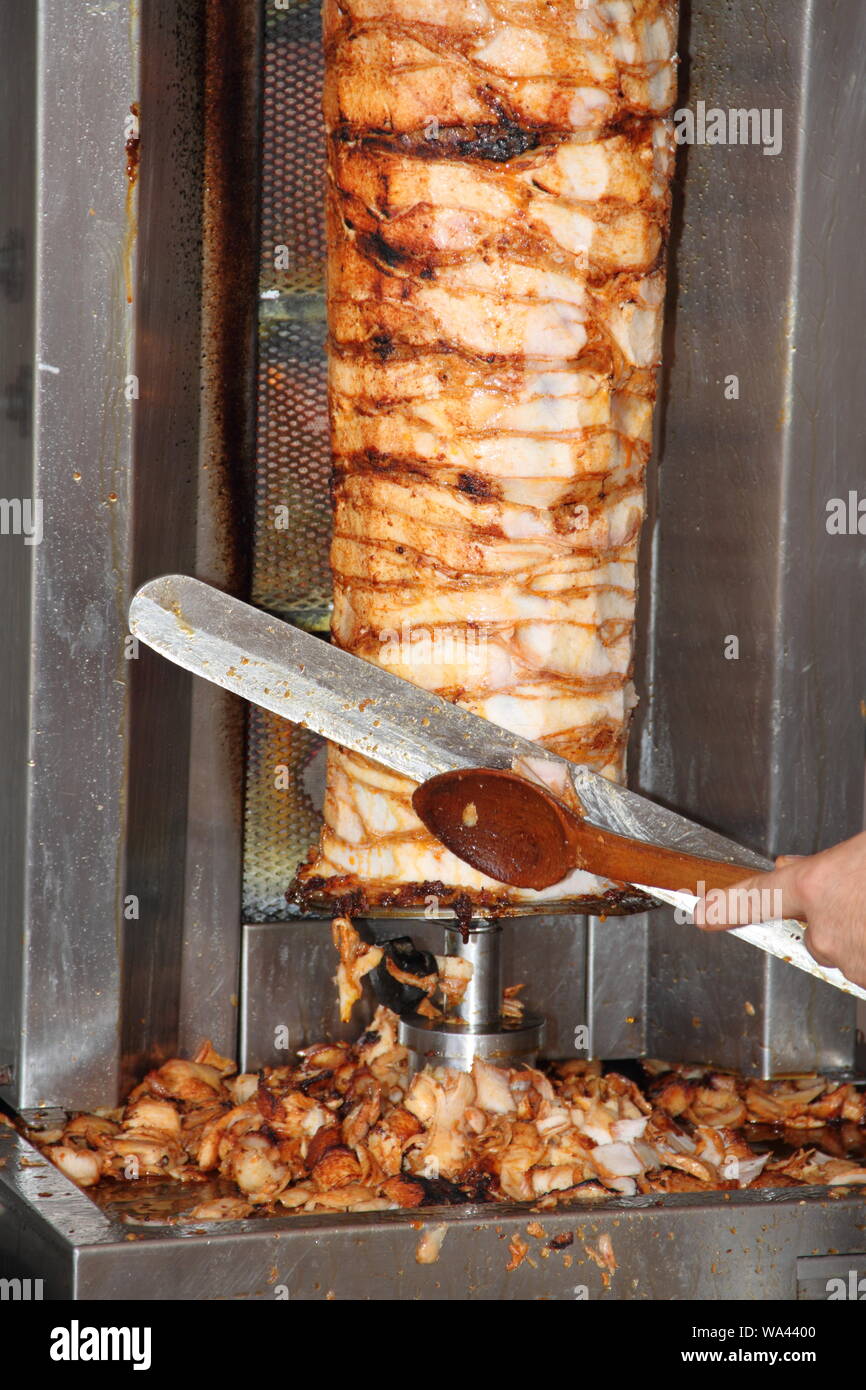 fresh doner kebab with a knife Stock Photo