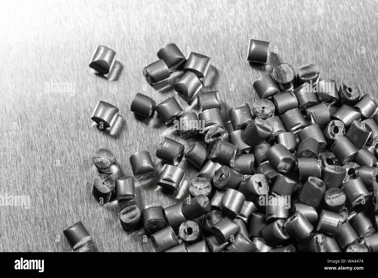silver polymer resin granulate in lab Stock Photo