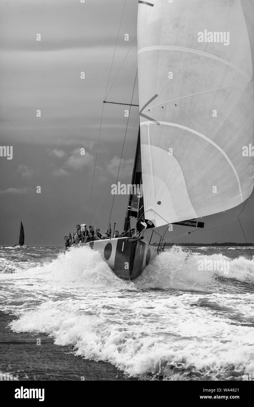 The Solent, Hampshire, UK; 16th August 2019; Black & White Portrait Image of Yacht in Heavy Seas Stock Photo